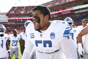 Intense Football Player Emotion Wallpaper