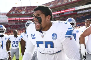 Intense Football Player Emotion Wallpaper