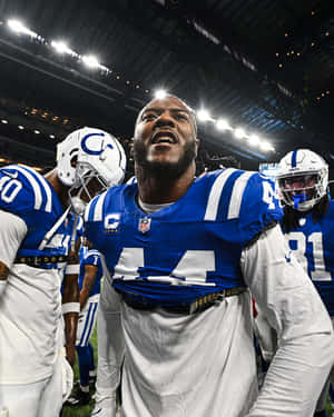 Intense Football Player Motivation Wallpaper