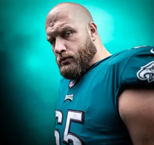 Intense Football Player Portrait Wallpaper