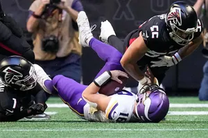 Intense Football Tackle Moment Wallpaper