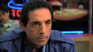 Intense Gaze Actor Diner Scene Wallpaper