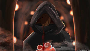 Intense Gaze From Obito Uchiha In Epic Battle Stance Wallpaper