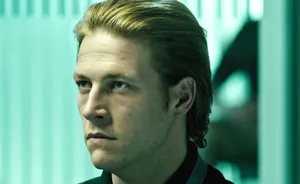 Intense Gaze Manin Greenish Hue Wallpaper