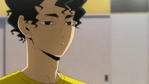 Intense Gaze Of Kiyoomi Sakusa On The Volleyball Court Wallpaper