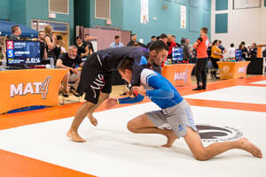 Intense Grappling Session In Brazilian Jiu-jitsu Wallpaper