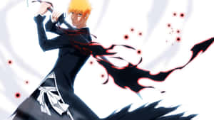 Intense Ichigo Kurosaki In Battle Stance Wallpaper