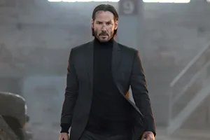 Intense Looking Manin Black Suit Wallpaper