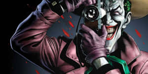 Intense Moment Between Batman And The Joker In The Killing Joke Wallpaper