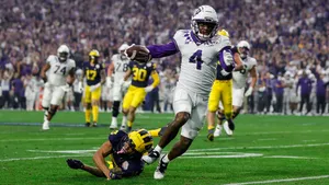 Intense Moment Of Football Tackle Wallpaper