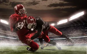 Intense_ Nighttime_ Football_ Tackle.jpg Wallpaper