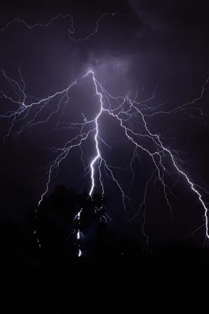 Intense Nighttime Lightning Strike Wallpaper