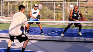 Intense Pickleball Match Action.jpg Wallpaper