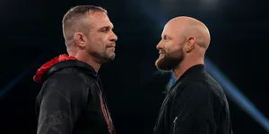 Intense Staredown Wrestling Ring Wallpaper