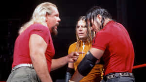 Intense Wrestling Confrontation Wallpaper