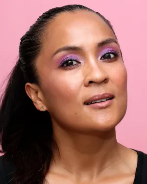 Intensify Your Look With This Daring Purple Eye Shadow For A Unique And Bold Statement Wallpaper