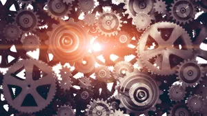 Interlocking Gearswith Sunburst Wallpaper