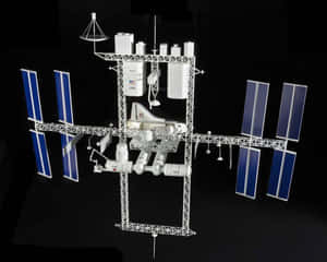 International Space Station Orbiting Earth Wallpaper