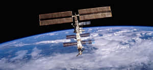 International Space Station Orbiting Earth Wallpaper