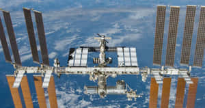 International Space Station Orbiting Earth Wallpaper