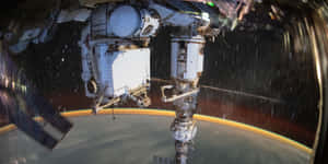 International Space Station Orbiting Earth Wallpaper