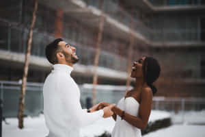 Interracial Couple Out In Snow Wallpaper