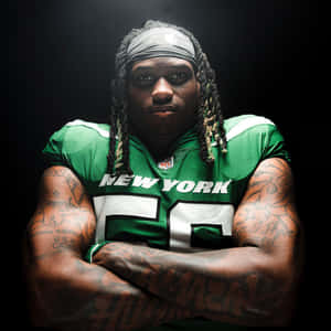 Intimidating Football Player Portrait Wallpaper