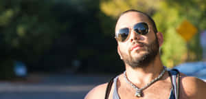Intimidating Man Wearing Sunglasses Wallpaper