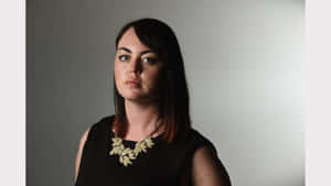 Intimidating Woman In Black Wallpaper