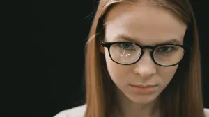 Intimidating Woman With Eyeglasses Wallpaper