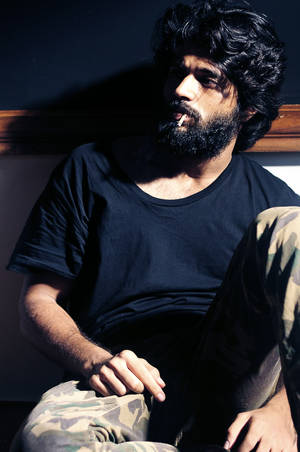 Introspective Arjun Reddy In A Corner Wallpaper