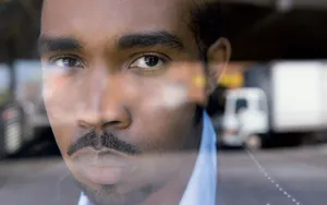 Introspective Man Portrait Wallpaper