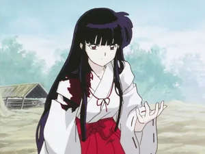 Inuyasha And Kikyo Sharing A Tender Moment Wallpaper