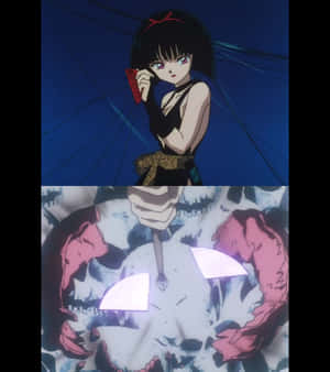 Inuyasha And Yura Battling In An Intense Scene Wallpaper