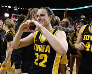 Iowa Basketball Player Celebration Wallpaper