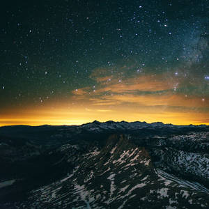 Ipad Pro Starry Sunset On Mountains Wallpaper