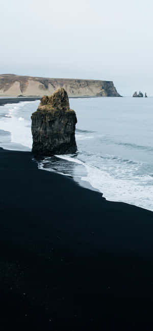 Iphone 16 Plus Black Sand Beach Wallpaper