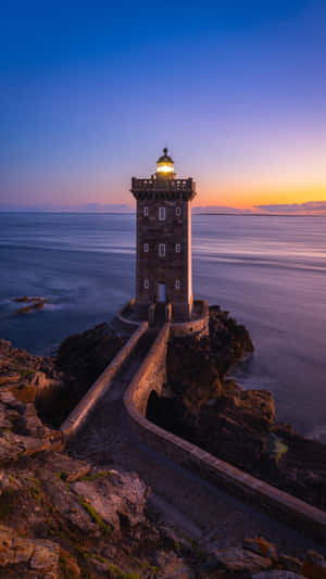 Iphone 17 Pro Lighthouse Shot Wallpaper