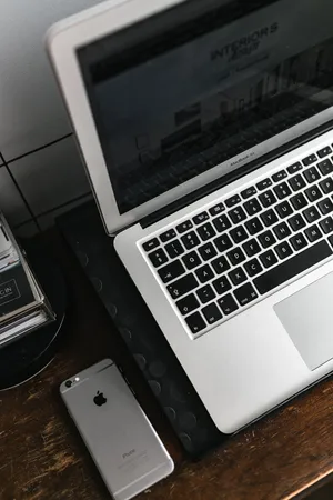 Iphone Desk With Silver Macbook Wallpaper