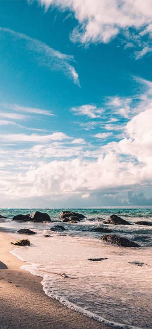 Iphone X Beach With Rocks Wallpaper