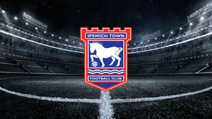 Ipswich Town Football Club In Action On The Pitch Wallpaper