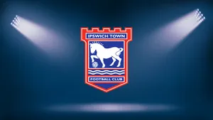 Ipswich Town Players Celebrating On The Field Wallpaper