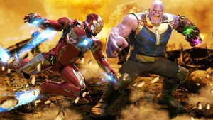Iron Man And Thanos Engage In Anticipated Epic Marvel Battle Wallpaper
