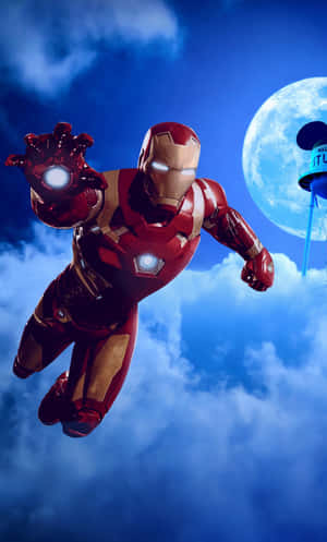 Iron Man In Flight Under Moonlight Wallpaper