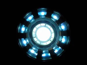 Iron Man Monument Illuminated By A Powerful Arc Reactor Wallpaper