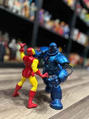 Iron Man Vs Iron Monger Action Figures Wallpaper