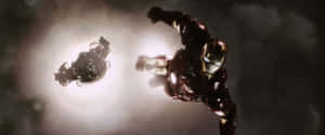 Iron Man Vs Iron Monger In Flight Battle Wallpaper