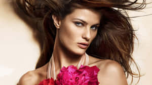 Isabeli Fontana Showcasing Elegance During A Photoshoot. Wallpaper