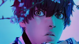 Isagi Yoichi Intense Gaze Under Cherry Blossoms Wallpaper