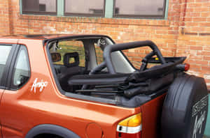 Isuzu Amigo Convertible Parked Brick Wall Wallpaper